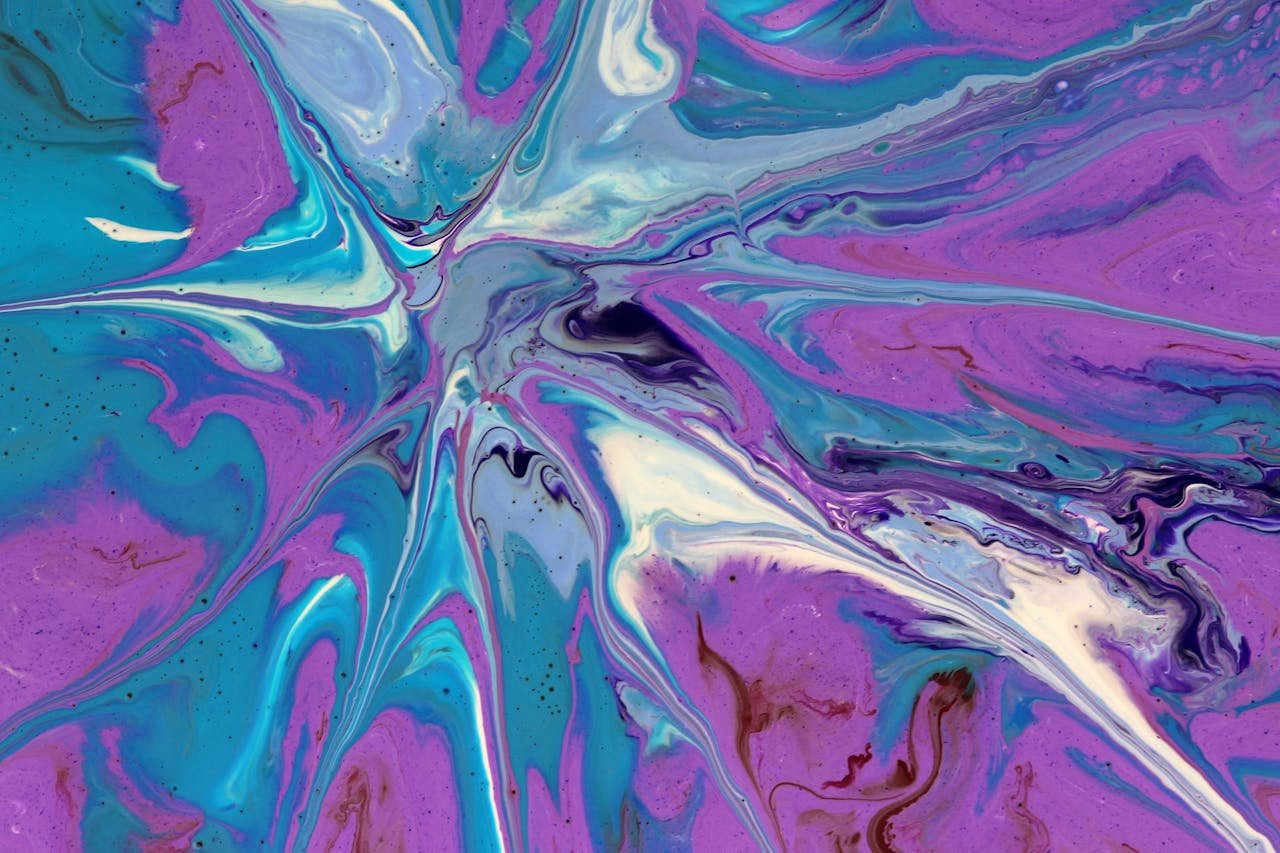 Stunning abstract fluid art featuring blue and purple swirls creating a captivating visual impact.